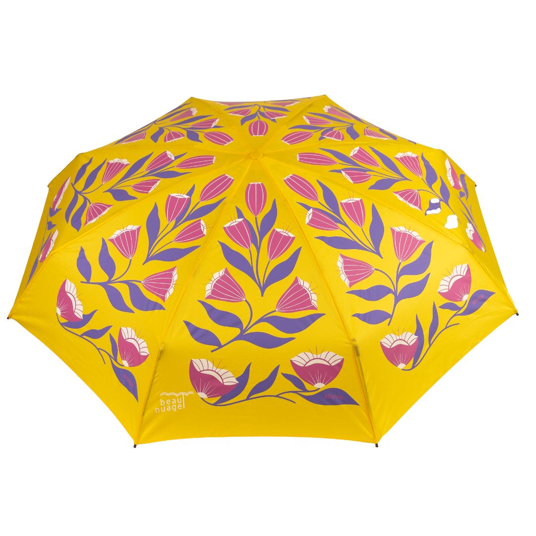 yellow umbrella with pink flowers